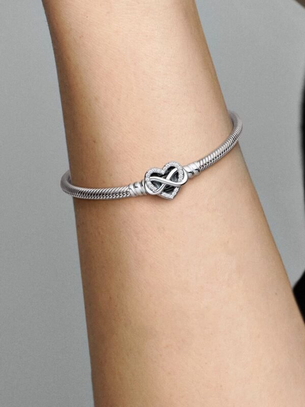 Bracciale Pandora Moments con maglia snake e chiusura a cuore con infinito scint